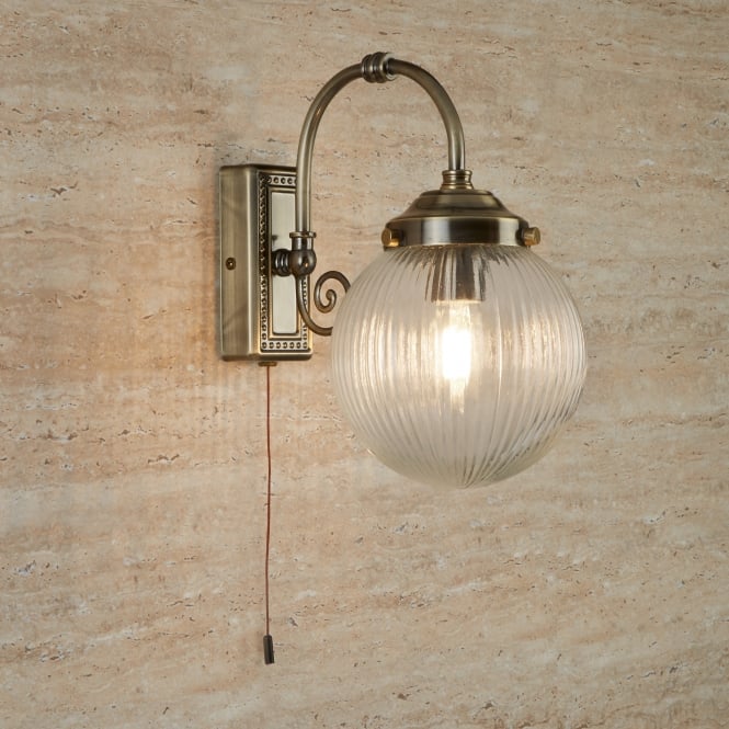 Searchlight Lighting Belvue Single Light Bathroom Wall Fitting in Antique Brass Finish With Clear Glass Shade